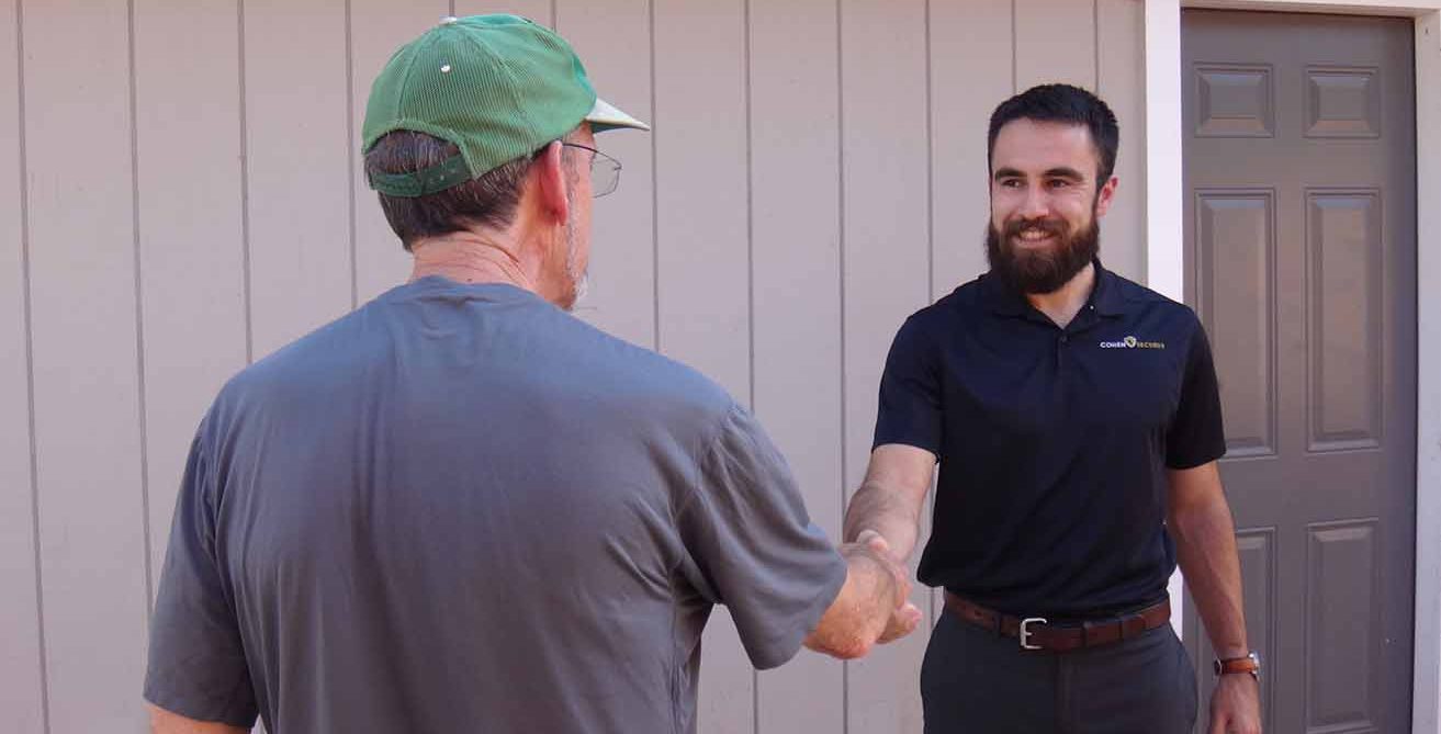 cohen security leader handshaking with client